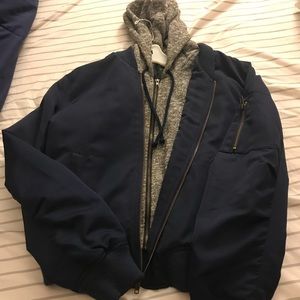 Blue/Grey Medium Sized Bomber jacket. Barley used
